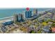 Coastal view featuring a resort and neighborhood, with a beach and ocean backdrop at 1012 N Waccamaw Dr. # 507, Murrells Inlet, SC 29576