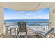 Relaxing balcony with ocean views, seating and lounging options at 1012 N Waccamaw Dr. # 507, Murrells Inlet, SC 29576