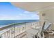 Ocean view balcony featuring seating with beach views at 1012 N Waccamaw Dr. # 507, Murrells Inlet, SC 29576