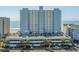 Mid-rise resort with on-site parking and partial ocean views from many floors at 1012 N Waccamaw Dr. # 507, Murrells Inlet, SC 29576