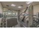 Bright fitness center with weights, exercise equipment and a pool view at 1012 N Waccamaw Dr. # 507, Murrells Inlet, SC 29576