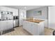 Charming kitchen with stainless steel appliances, white cabinets and island at 1012 N Waccamaw Dr. # 507, Murrells Inlet, SC 29576
