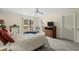 Cozy bedroom featuring serene golf course views and soft carpet flooring at 114 Laurelwood Ln., Conway, SC 29526