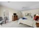 Well-lit bedroom featuring soft carpet flooring and neutral color palette at 114 Laurelwood Ln., Conway, SC 29526