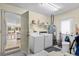 Spacious laundry room with washer, dryer, and access to the garage at 114 Laurelwood Ln., Conway, SC 29526