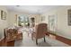 Well-lit living room with neutral decor and sliding doors that lead to the patio at 114 Laurelwood Ln., Conway, SC 29526