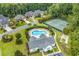 Aerial view of neighborhood amenities including the pool, tennis courts, and clubhouse at 1151 N Blackmoor Dr., Murrells Inlet, SC 29576