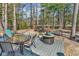 Cozy deck features an outdoor table and a wooded view at 1151 N Blackmoor Dr., Murrells Inlet, SC 29576