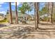 Spacious backyard featuring a patio area perfect for outdoor entertaining at 1151 N Blackmoor Dr., Murrells Inlet, SC 29576