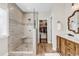 Beautiful bathroom featuring a walk-in shower and wooden cabinets at 1151 N Blackmoor Dr., Murrells Inlet, SC 29576