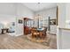 Dining room with hardwood floors, traditional furnishings, chandelier and view of the living room at 1151 N Blackmoor Dr., Murrells Inlet, SC 29576