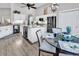 Bright kitchen featuring white cabinets, stainless steel appliances, and an island with marble countertops at 1151 N Blackmoor Dr., Murrells Inlet, SC 29576