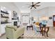 Inviting living room with a fireplace, comfortable seating, hardwood floors, and ample natural light at 1151 N Blackmoor Dr., Murrells Inlet, SC 29576
