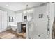 Modern bathroom featuring glass enclosed shower, soaking tub, and luxurious fixtures at 121 Ashworth Dr., Little River, SC 29566