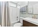 Cozy bathroom featuring a shower with curtain, toilet, and vanity at 121 Ashworth Dr., Little River, SC 29566