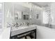 Modern bathroom featuring double sinks, patterned backsplash, and glass-enclosed shower with decorative tile at 121 Ashworth Dr., Little River, SC 29566