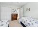 Light-filled bedroom with two twin beds, dresser, closet, and soothing paint color at 121 Ashworth Dr., Little River, SC 29566