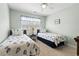 Guest bedroom with two twin beds, soothing paint color, and plantation shutters at 121 Ashworth Dr., Little River, SC 29566