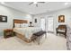 Inviting main bedroom with ceiling fan, and private access to outdoor patio at 121 Ashworth Dr., Little River, SC 29566