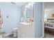 Cheerful bathroom with a vanity, flamingo accents, and a mirror, creating a bright and inviting space at 1500 Cenith Dr. # B402, North Myrtle Beach, SC 29582