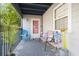 Relaxing front porch with comfortable seating and stylish decor, perfect for enjoying the coastal breeze at 1500 Cenith Dr. # B402, North Myrtle Beach, SC 29582