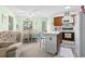 Open kitchen and dining area, perfect for entertaining and Gathering meals, with a relaxed coastal decor at 1500 Cenith Dr. # B402, North Myrtle Beach, SC 29582