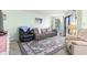 Relaxing living room with comfortable sofas, stylish decor, and plenty of natural light at 1500 Cenith Dr. # B402, North Myrtle Beach, SC 29582