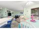 Open-concept living space with a dining area and comfortable seating arrangements at 1500 Cenith Dr. # B402, North Myrtle Beach, SC 29582