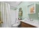Well-lit bathroom featuring a shower, toilet, vanity and decor at 168 Saint Christopher Circle, Pawleys Island, SC 29585