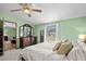 Comfortable bedroom with a wooden dresser and natural light from the window at 168 Saint Christopher Circle, Pawleys Island, SC 29585