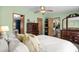 Spacious bedroom with a large bed and view of attached bathroom at 168 Saint Christopher Circle, Pawleys Island, SC 29585