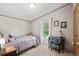 Bright bedroom with a cozy bed, desk with chair and natural light at 168 Saint Christopher Circle, Pawleys Island, SC 29585