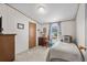 Cozy bedroom featuring a comfortable twin bed, desk, and ample natural light at 168 Saint Christopher Circle, Pawleys Island, SC 29585