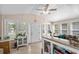 Sun room featuring tiled floors, lots of natural light, and neutral paint at 168 Saint Christopher Circle, Pawleys Island, SC 29585