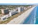 Aerial shot showcases the expansive coastline, nearby hotels, and sandy beach at 1709 S Ocean Blvd. # 608, North Myrtle Beach, SC 29582