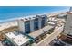 Aerial view of the condo building near the beach, showcasing its proximity to the ocean at 1709 S Ocean Blvd. # 608, North Myrtle Beach, SC 29582