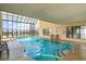 Bright indoor pool with lots of natural light, lounge chairs, and clear safety rules posted at 1709 S Ocean Blvd. # 608, North Myrtle Beach, SC 29582