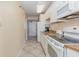 Bright condo kitchen with modern appliances and granite countertops at 1709 S Ocean Blvd. # 608, North Myrtle Beach, SC 29582