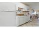 Condo kitchen with granite countertops and modern appliances at 1709 S Ocean Blvd. # 608, North Myrtle Beach, SC 29582