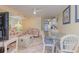 Condo living room features a dining area and access to the kitchen at 1709 S Ocean Blvd. # 608, North Myrtle Beach, SC 29582