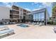 Exterior image of the pool area featuring a hot tub and seating area for residents and guests at 1709 S Ocean Blvd. # 608, North Myrtle Beach, SC 29582