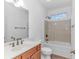 Updated bathroom features a white vanity, a shower-tub combination, and tile floors at 178 Kessinger Dr., Surfside Beach, SC 29575