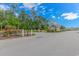 Welcoming gated community entrance with landscaped greenery, brick accents, and a secure entry point at 178 Kessinger Dr., Surfside Beach, SC 29575