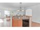 Kitchen with breakfast bar, stainless steel appliances, and an open dining area at 178 Kessinger Dr., Surfside Beach, SC 29575