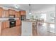 Beautiful eat-in kitchen area with breakfast bar, tile floors, and access to dining and living areas at 178 Kessinger Dr., Surfside Beach, SC 29575