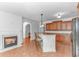 Open concept kitchen area with fireplace and access to living spaces at 178 Kessinger Dr., Surfside Beach, SC 29575