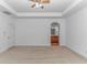 Spacious main bedroom with ceiling fan, tray ceilings and view to attached bath at 178 Kessinger Dr., Surfside Beach, SC 29575
