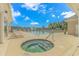 Inviting pool area featuring a large swimming pool, hot tub, lounge chairs, and a gazebo for relaxation at 178 Kessinger Dr., Surfside Beach, SC 29575