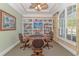 Charming recreation room with built-in bookshelves, a large window, and a table ideal for gaming at 178 Kessinger Dr., Surfside Beach, SC 29575