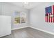 Bedroom with lots of natural light, ceiling fan, and plank flooring at 197 Northside Dr., Little River, SC 29566